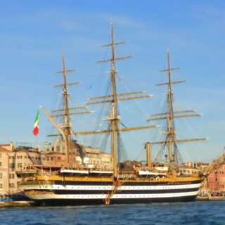 Wandering around the Canal and the Sea ...
In 1925, the Regia Marina ordered two school ships to a design by General Lieutenant Francesco Rotundi of the Italian Navy Engineering Corps, inspired by the style of large late 18th century 74-cannon ships of the line. The first, the Cristoforo Colombo, was put into service in 1928 and was used by the Italian Navy until 1943. 
The second ship was the Amerigo Vespucci, built in 1930 at the (formerly Royal) Naval Shipyard of Castellammare di Stabia (Naples). It was launched on February 22, 1931 and put into service in July of the same year. The Amerigo Vespucci has 26 sails – square sails, staysails, and jibs: all are traditional canvas sails. When under sail in severe sea and wind conditions she can reach 12 knots (22 km/h). 
The hull is painted black with two white stripes, harking back to the two gun decks of the ships while the deck planks are of teak wood and must be replaced every three years. Bow and stern are decorated with intricate ornaments; she has a life-size figurehead of Amerigo Vespucci. The stern gallery is accessible only through the Captain's saloon.
The standard crew of the Amerigo Vespucci is 16 officers, 70 non-commissioned officers and 190 sailors. In summer, when she embarks the midshipmen of the Accademia Navale, the crew totals some 450.
Other than during World War II, the Amerigo Vespucci has been continually active. Most of her training cruises are in European waters, but she has also sailed to North and South America, and navigated the Pacific. In 2002, she undertook a voyage around the world. In 1960, Vespucci carried the Olympic torch from Piraeus to Syracuse for the Summer Olympics in Rome.
While sailing the Mediterranean Sea in 1962, the American aircraft carrier USS Independence flashed the Amerigo Vespucci with the light signal asking: "Who are you?" The full-rigged ship answered: "Training ship Amerigo Vespucci, Italian Navy." The Independence replied: "You are the most beautiful ship in the world."

#amerigovespucci #ship #navy #italianship #veniceunexpected #sailor #gold #blackandwhite #history #venicehistory #sanmarco #stmark #navesanmarco #italiannavy #italiannavy🇮🇹